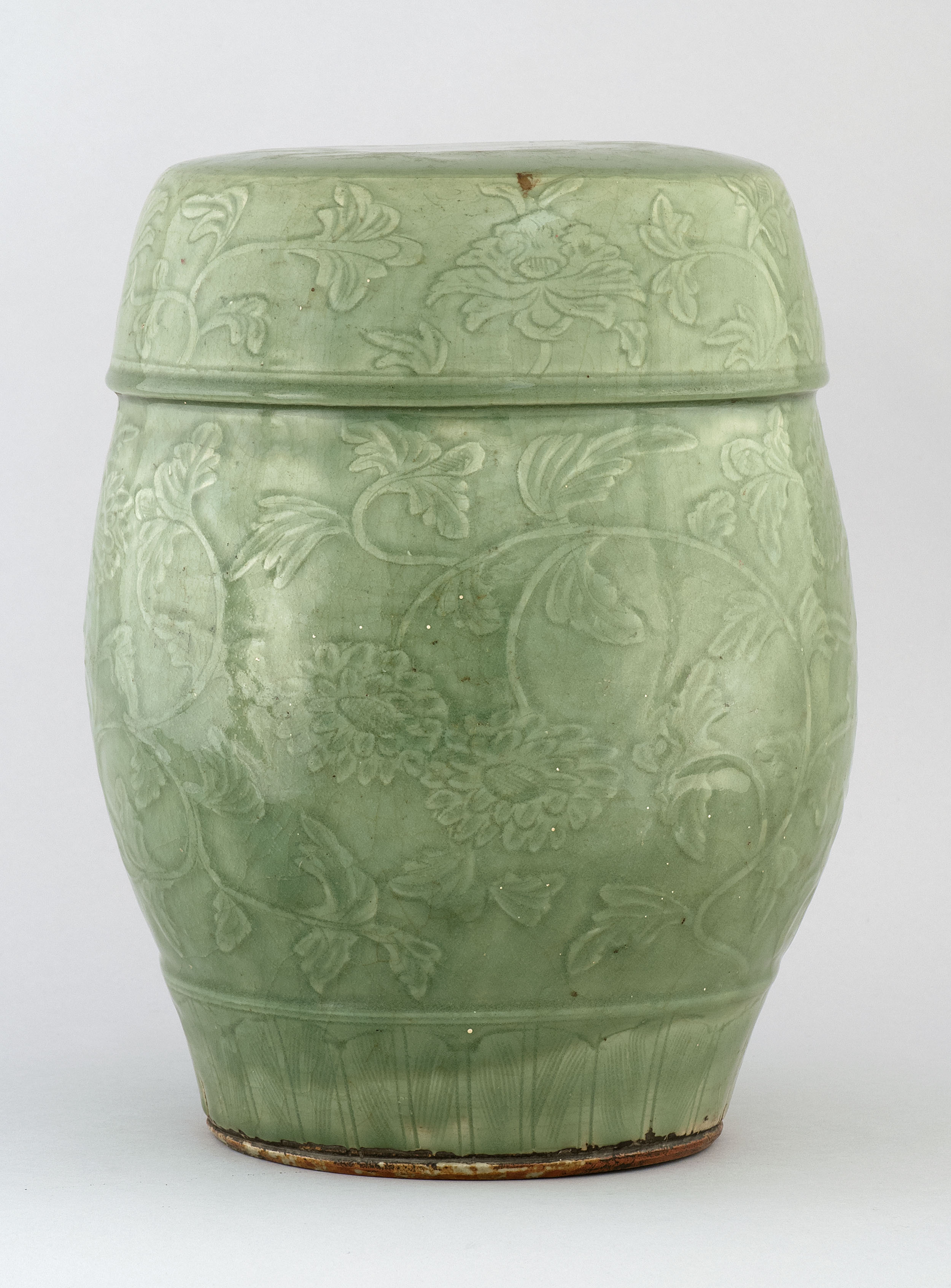 Appraisal: CELADON STONEWARE GARDEN BARREL Ming DynastyIn drum form with carved