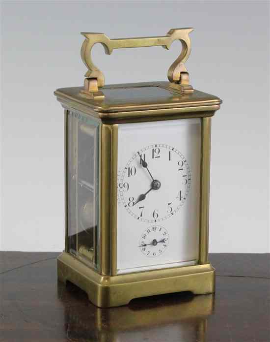 Appraisal: An Edwardian brass carriage alarm clock with enamelled dial and