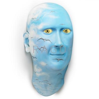 Appraisal: JOHN WOODWARD b Massive wall-mounted ceramic head sculpture painted with