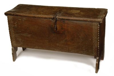 Appraisal: A th century planked oak chest with carved and stamped