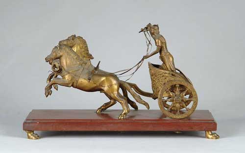 Appraisal: BRONZE ROMAN CHARIOT MOUNTED ON MARBLE BASE Rectangular molded edge