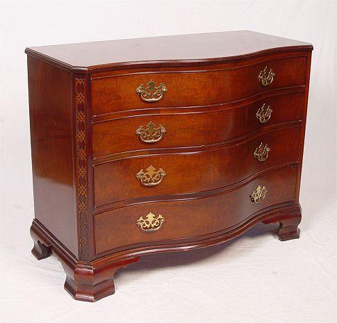 Appraisal: BAKER FURNITURE BANDED MAHOGANY SERPENTINE FRONT CHEST Four drawer chest