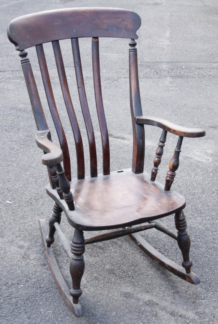 Appraisal: A thC ash and elm grandfather rocking chair with a