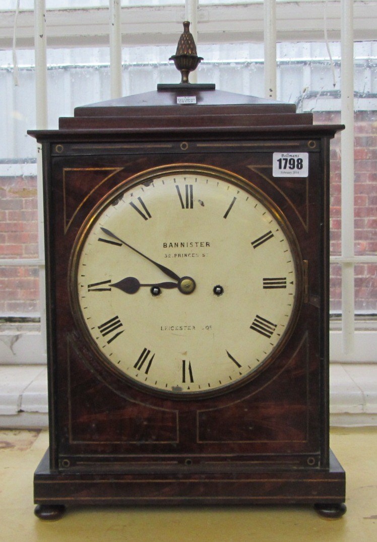 Appraisal: A flame mahogany and brass inlaid mantel clock th century