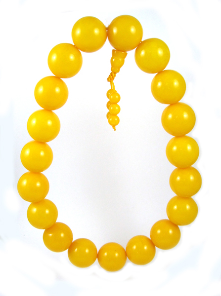 Appraisal: BALTIC HONEY PRESSED AMBER PRAYER BEADS with large mm beads