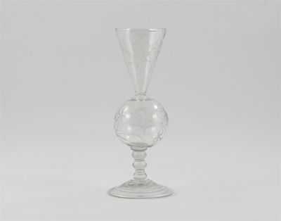 Appraisal: A tall dated glass goblet with flared bowl issuing from