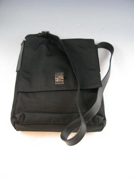 Appraisal: Black Gucci Canvas Messenger Bag made of fine canvas with