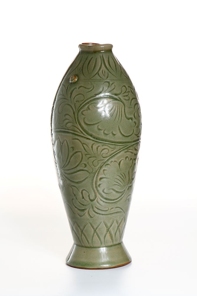 Appraisal: Rare Yaozhou Celadon Carved 'Fish Form' Vase Finely potted as