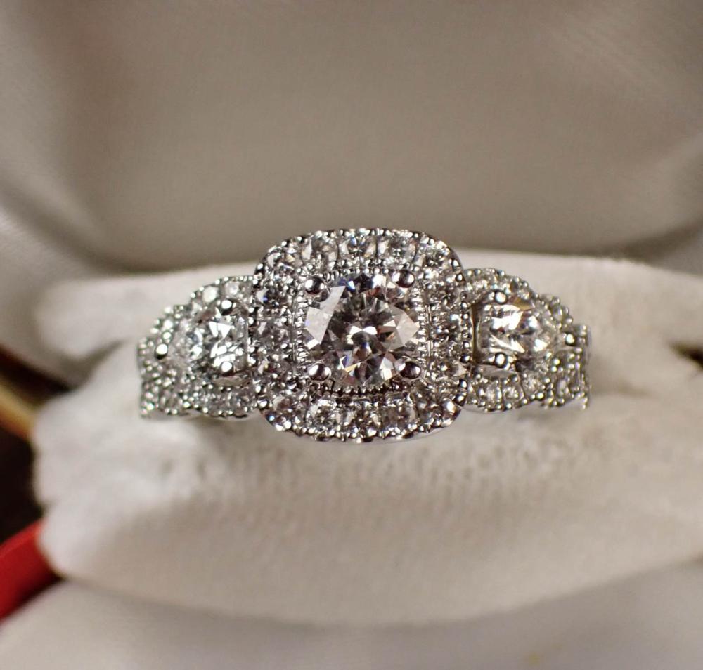 Appraisal: DIAMOND SAPPHIRE AND FOURTEEN KARAT GOLD RING The k white