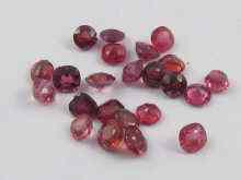 Appraisal: A quantity of loose polished red gemstones including rubies and