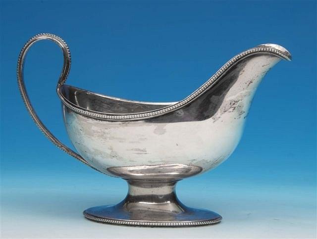 Appraisal: A Georgian silver sauce boat with beaded rim and marks