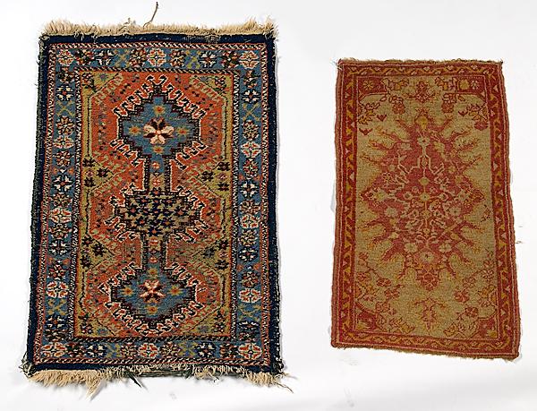 Appraisal: TWO AREA RUGS The smaller an angora oushak with medallion