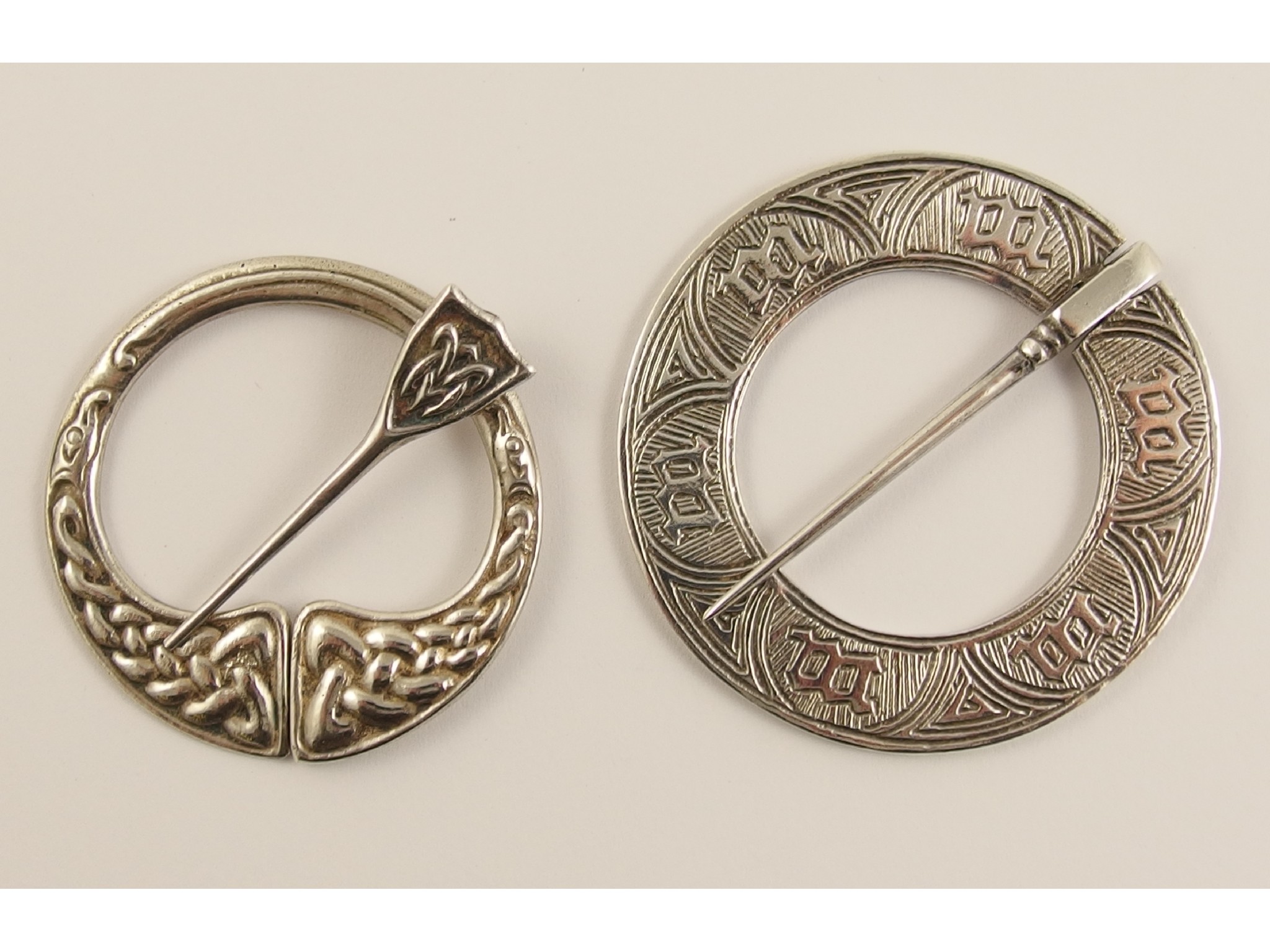 Appraisal: Two Alexander Ritchie broochesan annular marriage brooch circular form with