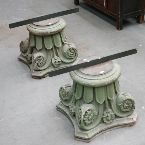 Appraisal: A pair of carved wooden capitals painted green North India