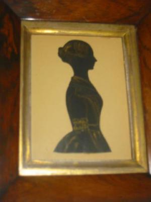 Appraisal: ENGLISH SCHOOL Silhouette Portrait of a Lady half length profile