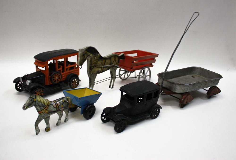 Appraisal: FIVE VINTAGE TOYS including Iron Art cast iron sedan wood