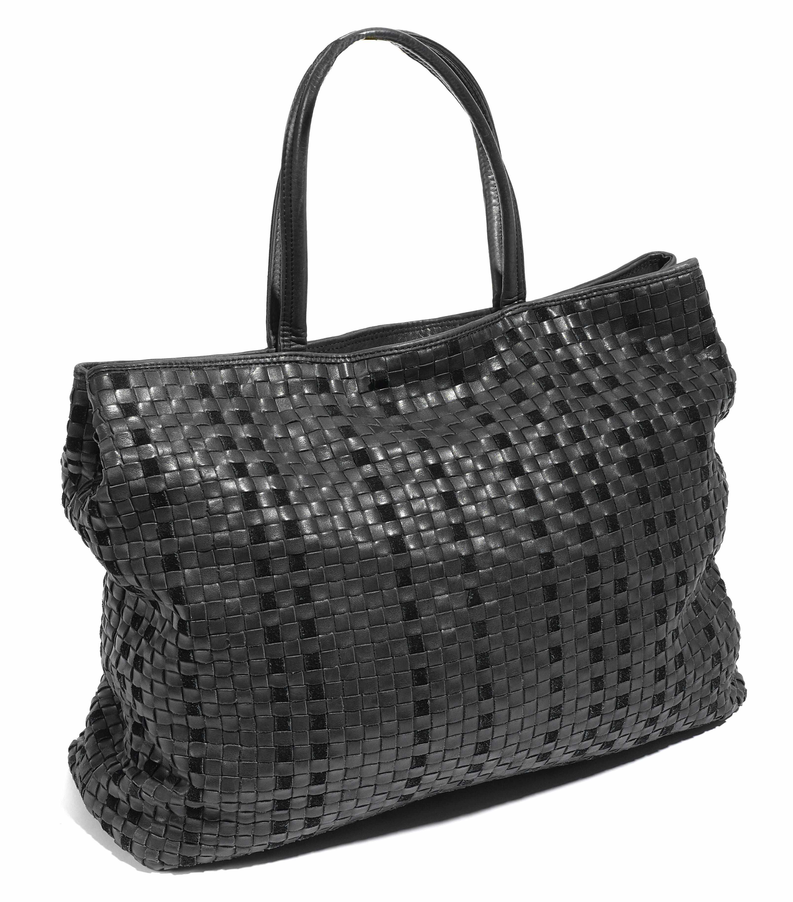 Appraisal: A Bottega Veneta black woven leather handbag x x in