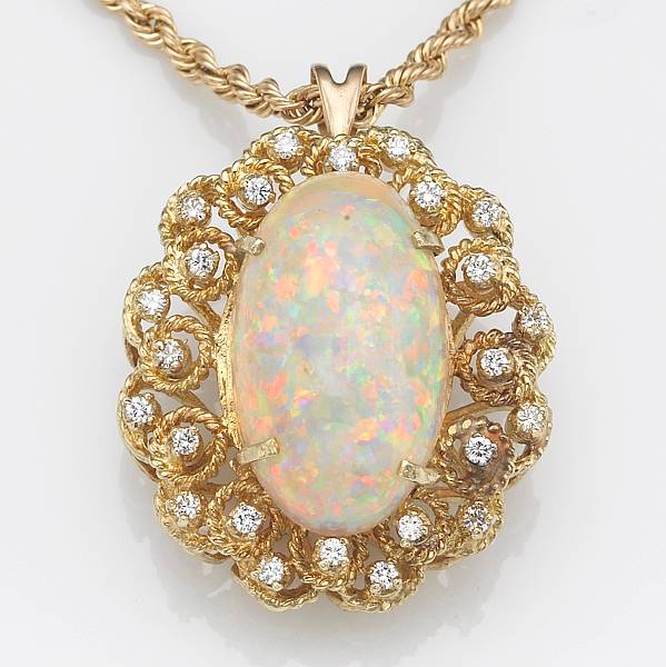 Appraisal: An opal diamond k gold pendant-brooch with chain length in