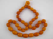 Appraisal: A large graduated amber bead necklace largest bead approx x