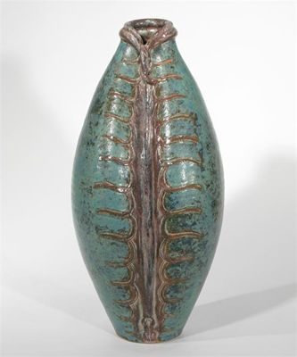 Appraisal: A Roger Cockram Cowrie Shell vase incised decoration glazed blue