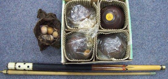 Appraisal: Four lignum vitae lawn bowls sundry balls and a snooker