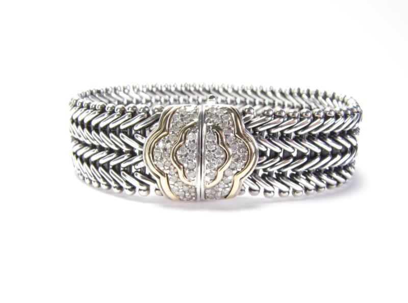 Appraisal: A sterling silver herringbone pattern fashion bracelet with unique sliding