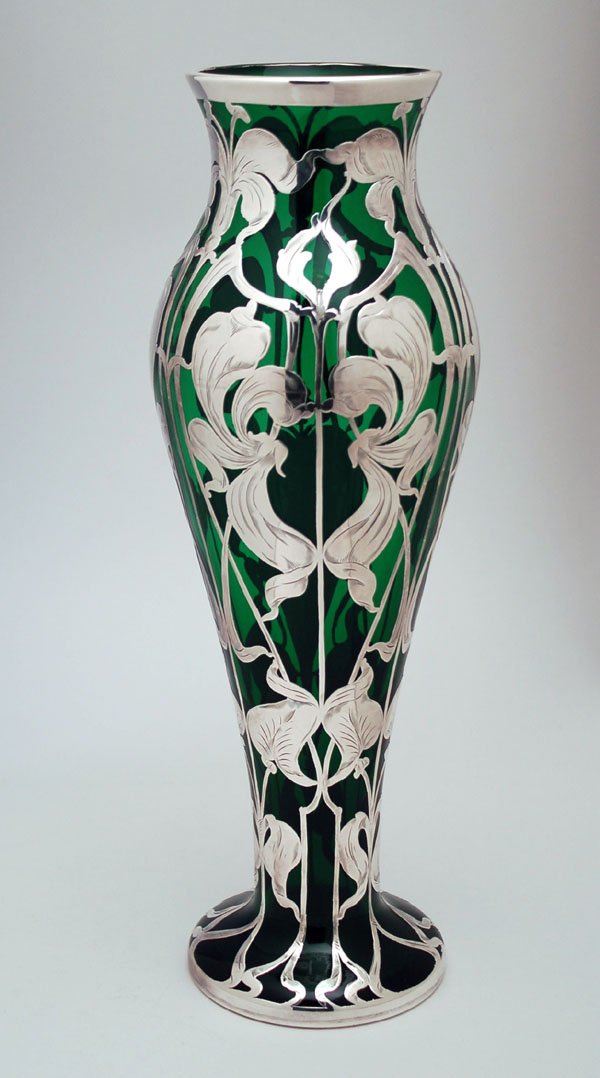 Appraisal: Art Nouveau vase of green glass baluster form with stylized