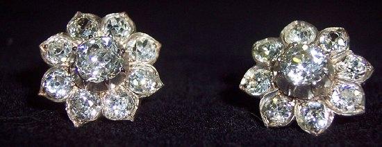 Appraisal: A pair of diamond cluster earrings in a French fitted