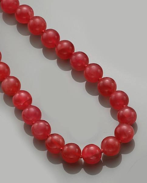 Appraisal: Rhodochrosite Necklace Argentina Designed as a uniform strand of spherical