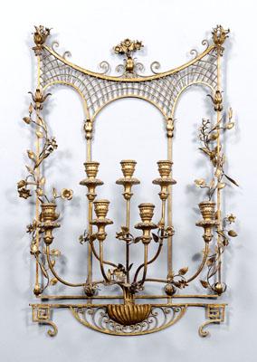 Appraisal: Gilt iron sconce seven composition candle sockets emanating from scroll