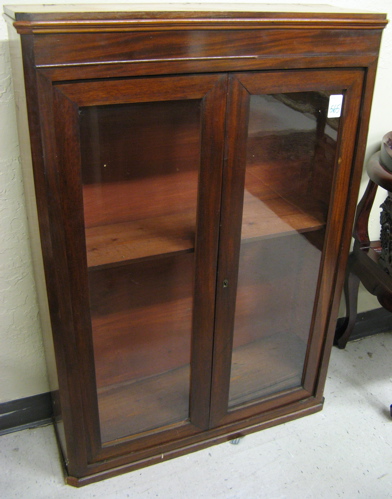 Appraisal: LOUIS PHILIPPE MAHOGANY CABINET BOOKCASE French c with adjustable wood