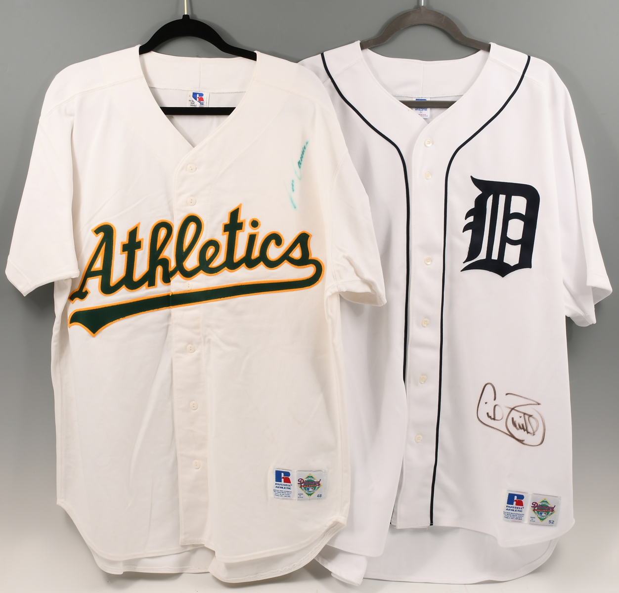 Appraisal: TWO SIGNED MLB JERSEYS Jose Canseco blurry signature size Russell