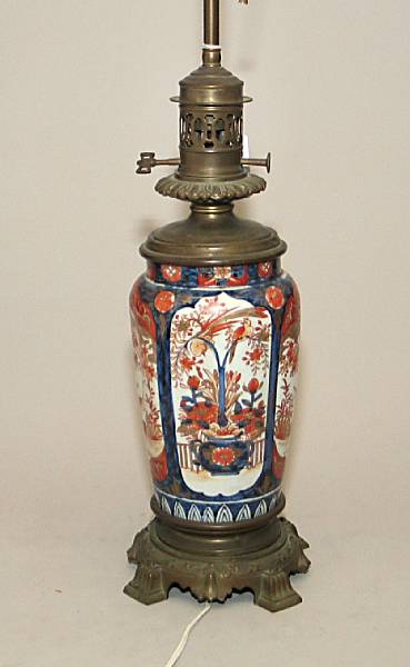 Appraisal: A Japanese Imari porcelain and bronze mounted oil lamp early