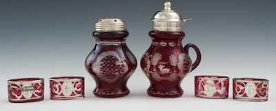 Appraisal: A Bohemian Glass Sugar Caster Syrup Jug and four Ruby