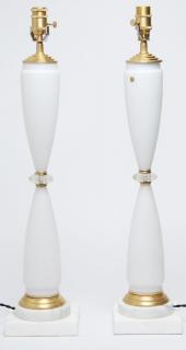 Appraisal: Pair of German Mid White matte glass bodies gilt metal