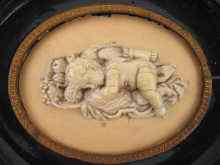 Appraisal: A very fine carved ivory plaque in high relief of