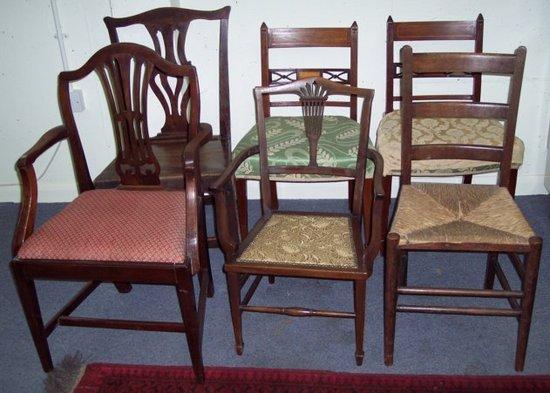 Appraisal: A pair of Edwardian side chairs the inlaid backs flanked