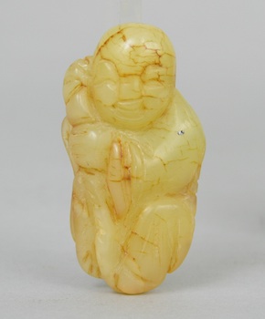 Appraisal: A Chinese Carved Jade Ornament of a Boy A Chinese