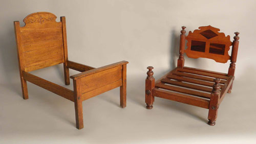 Appraisal: Two Victorian doll beds x x and x x