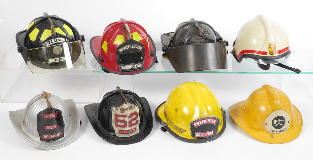 Appraisal: VINTAGE FIRE FIGHTERS HELMETS An assembled collection of total various