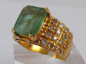 Appraisal: A yellow metal tests carat gold emerald and diamond ring