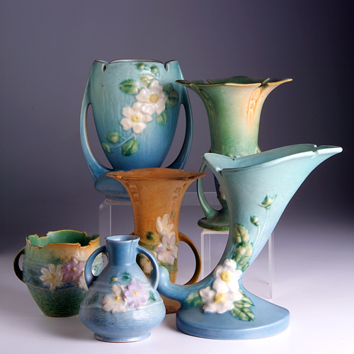 Appraisal: Six ROSEVILLE pieces to include a green Cosmos vase -