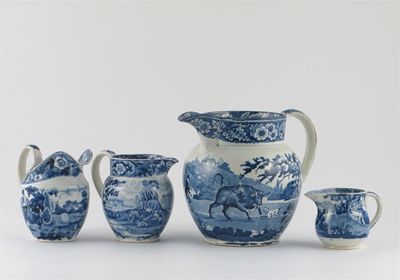 Appraisal: Four blue and white jugs printed with figures at various