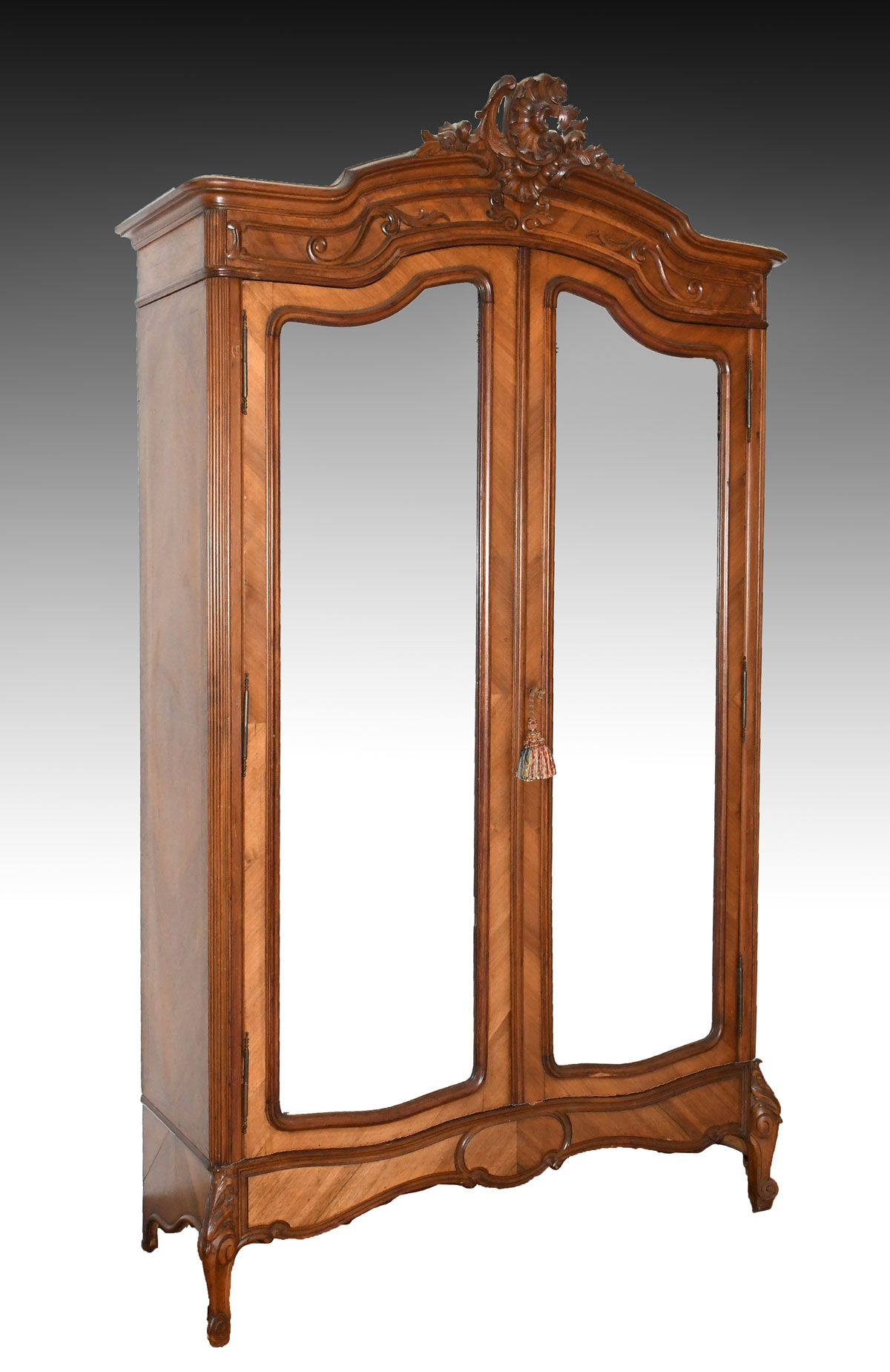 Appraisal: FRENCH CARVED WALNUT ARMOIRE th century French Rococo Revival walnut