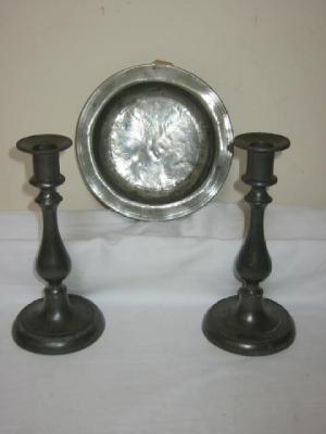 Appraisal: A PAIR OF PEWTER CANDLESTICKS of baluster form with urn