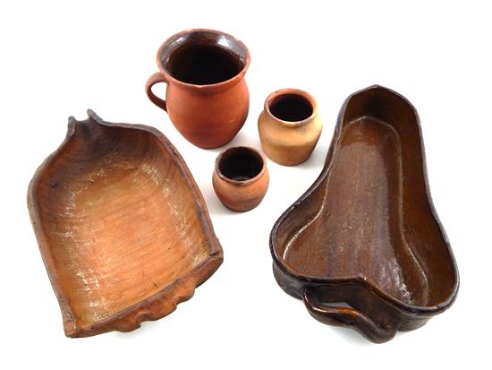 Appraisal: Five pieces of partially glazed redware butternut squash form mold