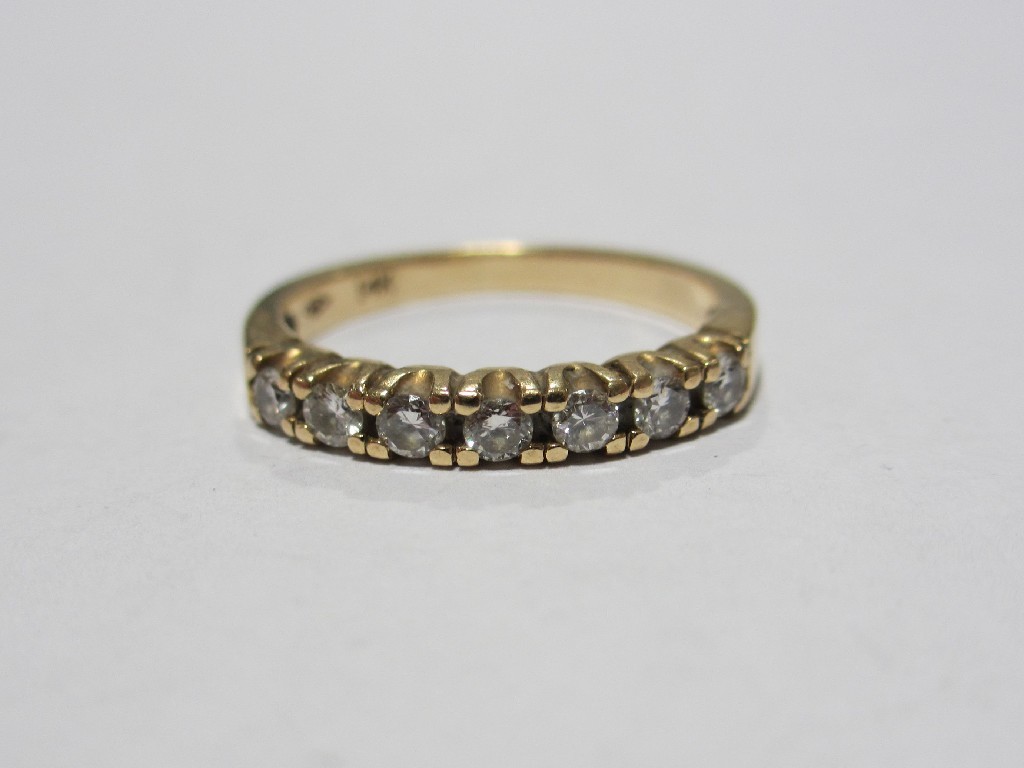 Appraisal: Fourteen carat gold diamond half hoop ring