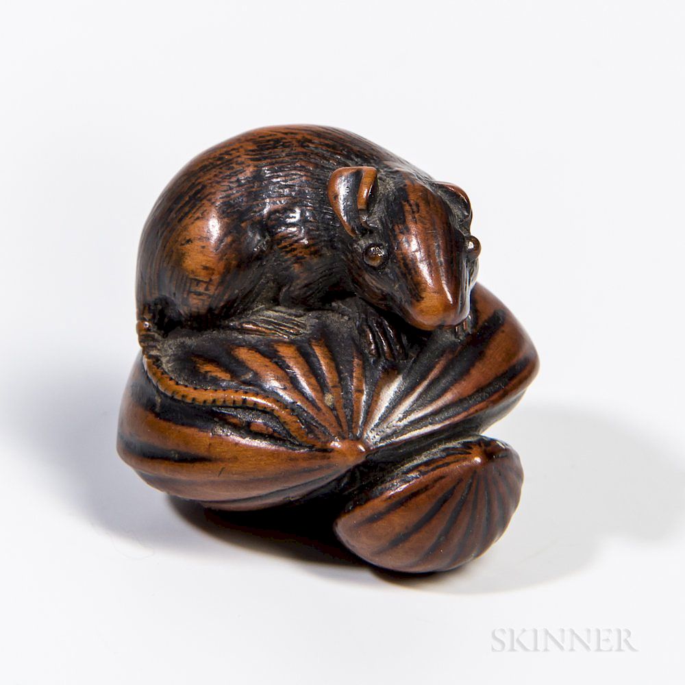 Appraisal: Lacquered Wood Netsuke Lacquered Wood Netsuke Japan th century in