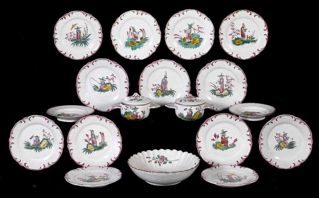 Appraisal: A FRENCH FAIENCE DESSERT SERVICE painted in Luneville style in