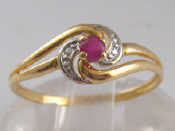 Appraisal: A yellow metal tests carat gold ruby and diamond ring